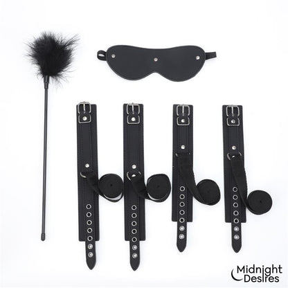 Midnight Desires set bondage con esposas, antifaz y pluma "Midnight Desires"