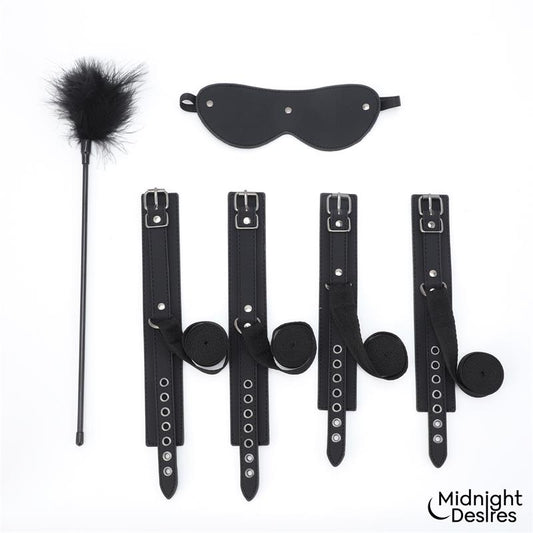 Midnight Desires set bondage con esposas, antifaz y pluma "Midnight Desires"